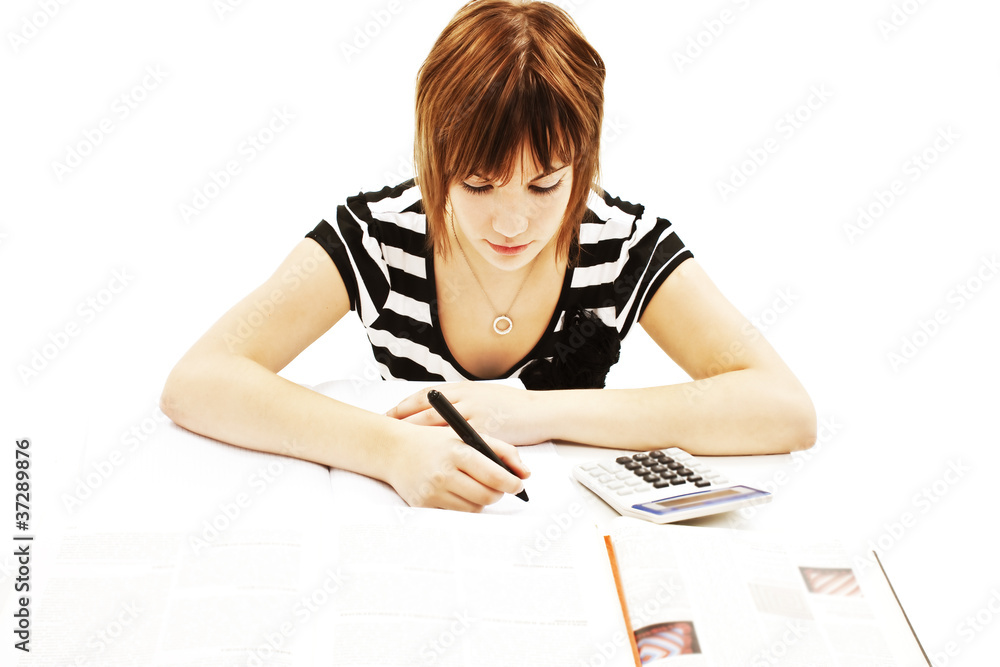 Young and beautiful student girl at the desk Young and beautiful student girl at the desk