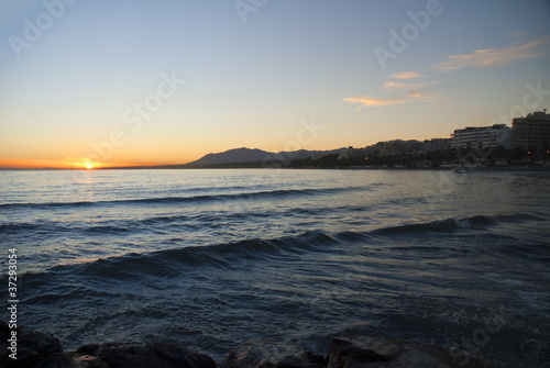 Sunset over beach at Marbella on Costa del Sol Spain © quasarphotos