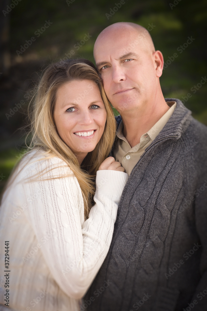 Fototapeta premium Attractive Couple Wearing Sweaters in Park