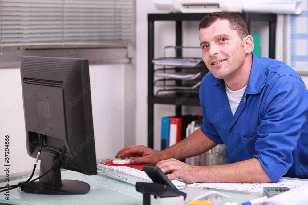 factory worker in his office factory worker in his office