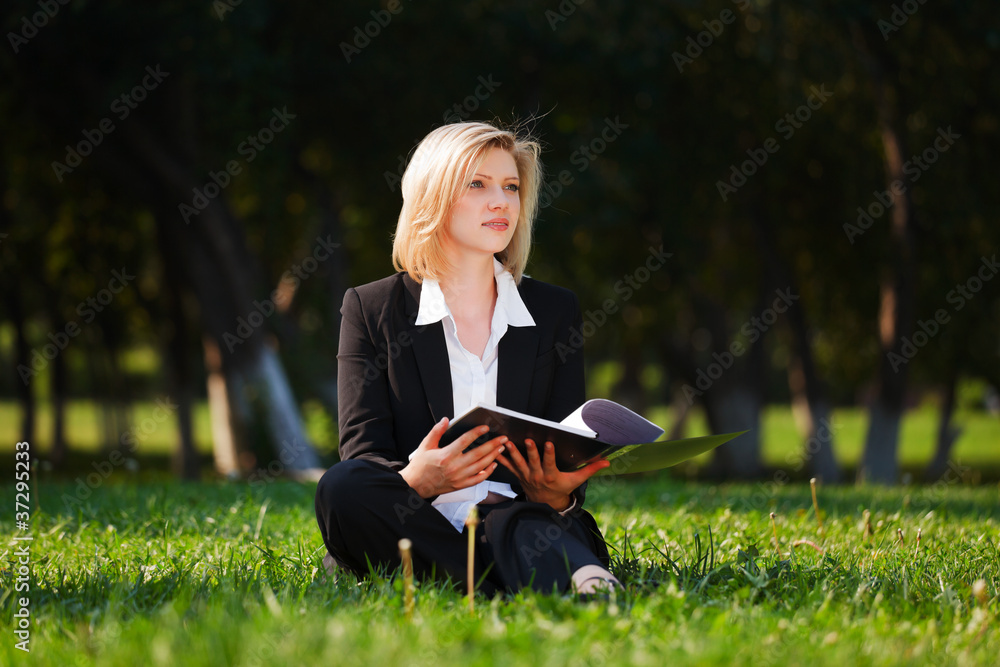 Young businesswoman with a folder Young businesswoman with a folder