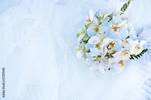 bouquet of flowers and wedding dress