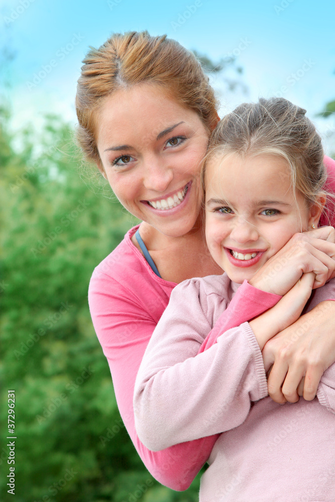 Portrait of mother and daughter