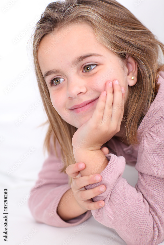 Portrait of cute little girl with hands on chin Portrait of cute little girl with hands on chin