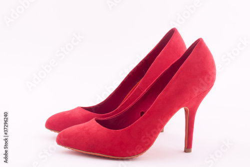 a pair of red heel shoes