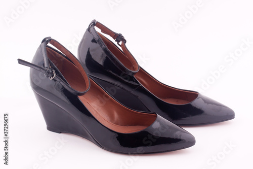 a pair of black platform shoes