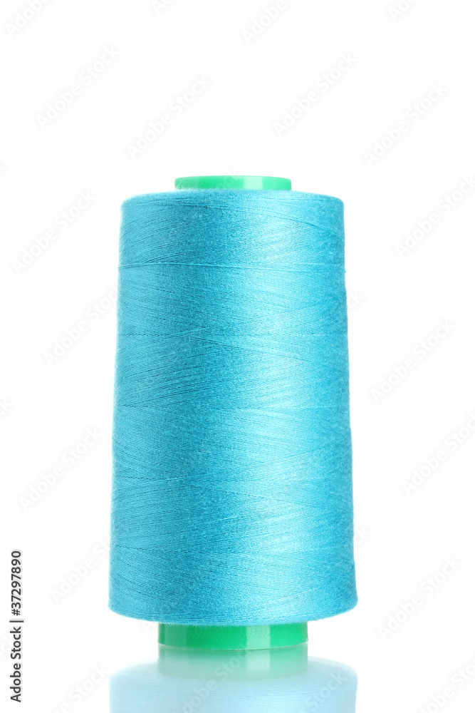 Blue bobbin thread isolated on white Blue bobbin thread isolated on white