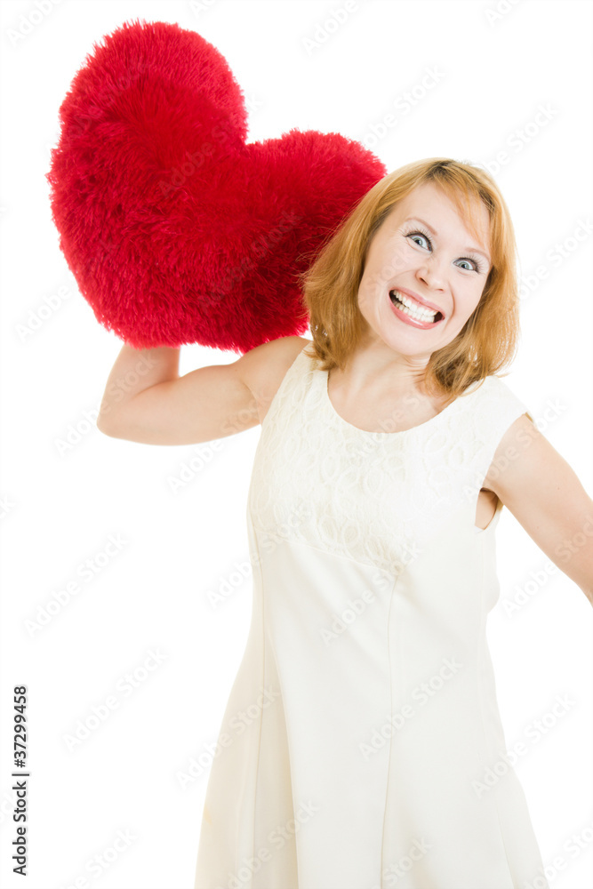 Wicked girl throws a heart on a white background. Wicked girl throws a heart on a white background.