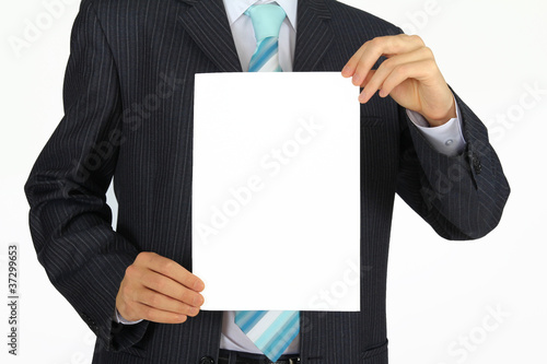 businessman holding a sign