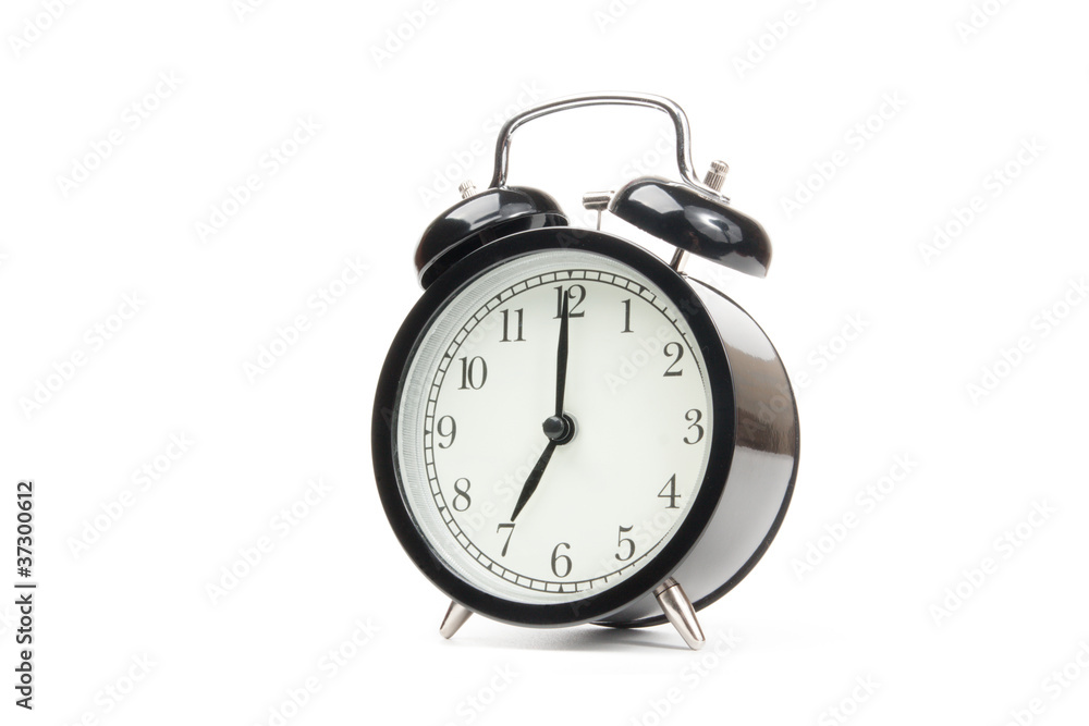 Alarm Clock isolated on the white background Alarm Clock isolated on the white background
