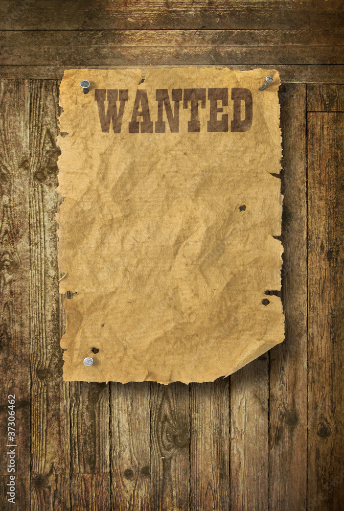 Obraz premium Wild West wanted poster on old wooden wall