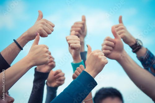 College Students with Thumbs Up photo