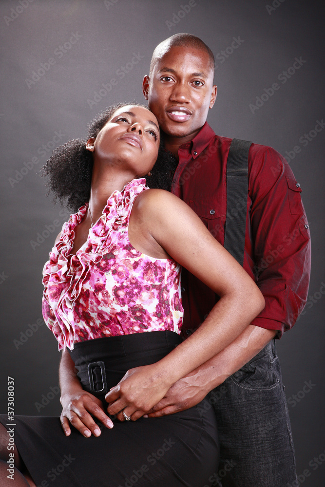 Obraz premium Young african american couple on black