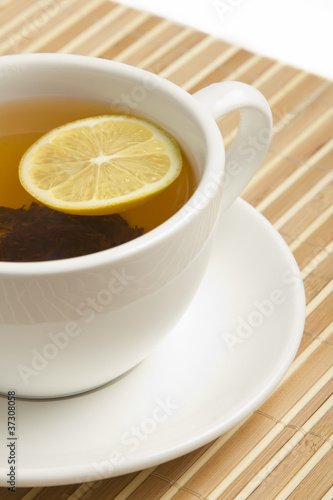 Tea cup with lemon