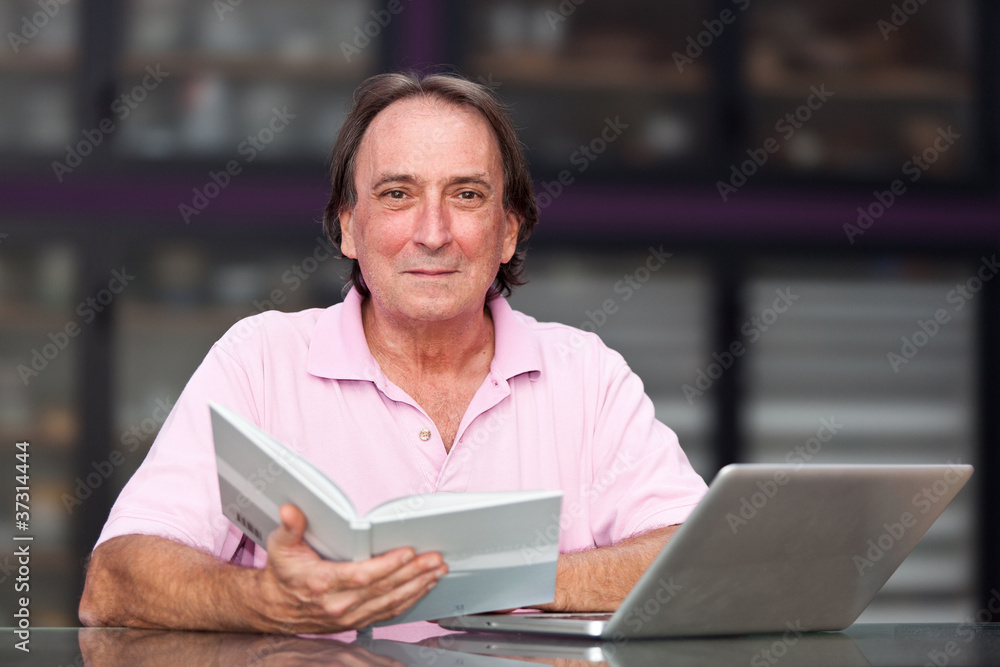 Senior Man with Computer at Office Senior Man with Computer at Office