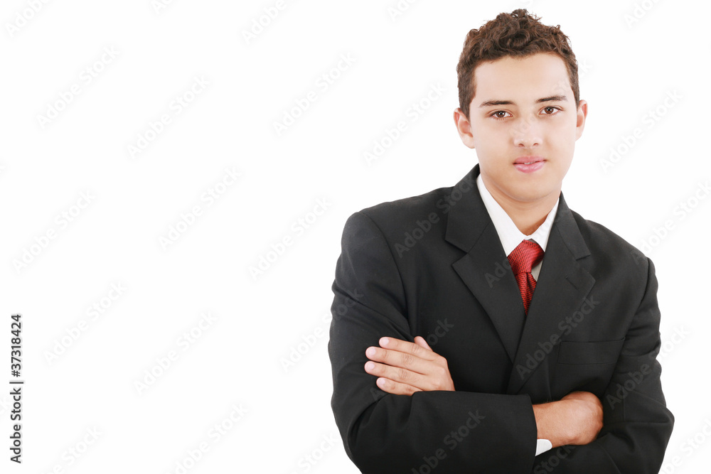 Young business man standing against the wall with crossed arms Young business man standing against the wall with crossed arms