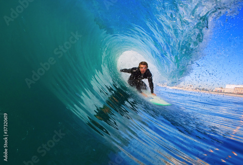 Surfer on Blue Ocean Wave in the Tube