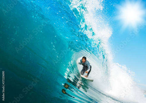 Surfer on Blue Ocean Wave © EpicStockMedia