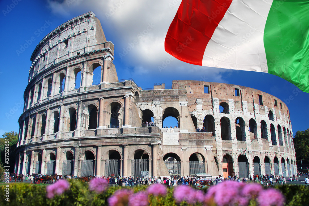 Fototapeta premium Colosseum with flag of Italy , Rome
