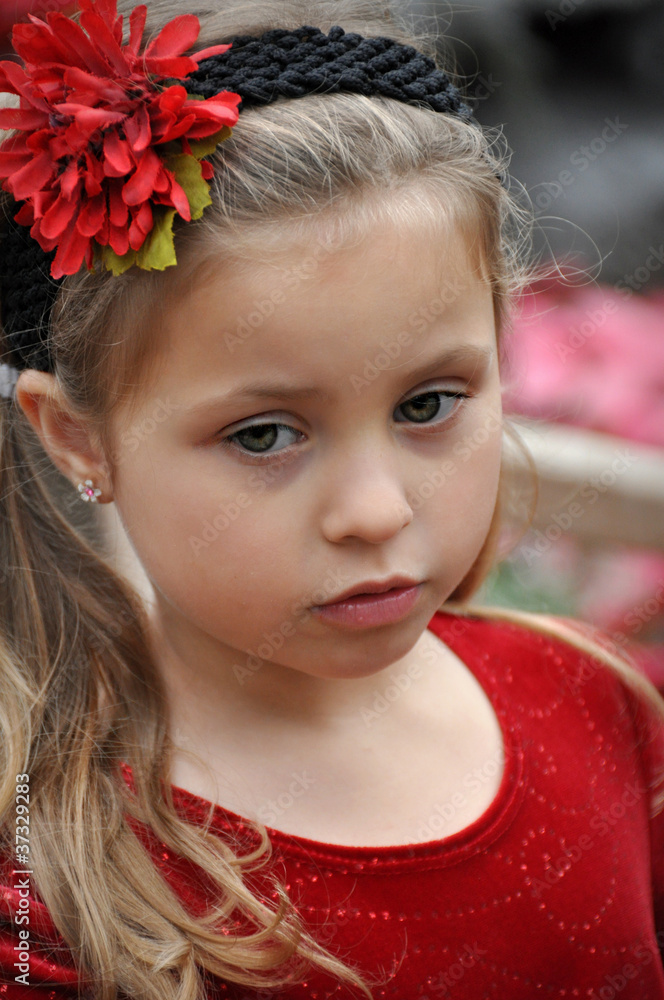 Pretty little girl with solemn expression Pretty little girl with solemn expression