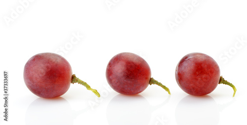 Картината върху платно Three berries of red grapes abreast
