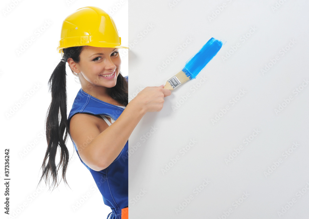 Beautiful young woman doing repairs Beautiful young woman doing repairs