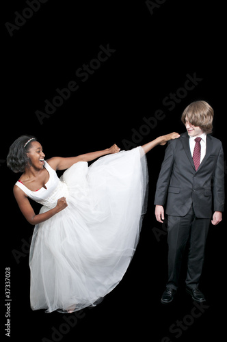 Black Woman kicking man