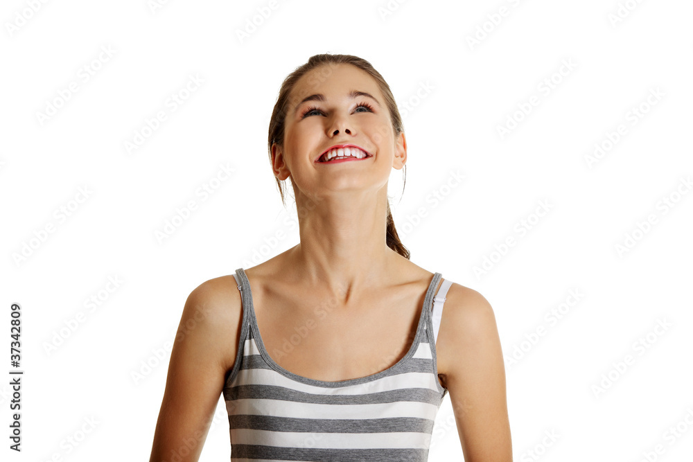 Female caucasian teen looking up. Female caucasian teen looking up.