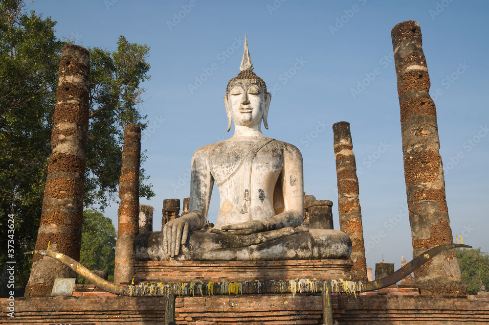 ancient buddha image statue at Sukhothai historical park ancient buddha image statue at Sukhothai historical park