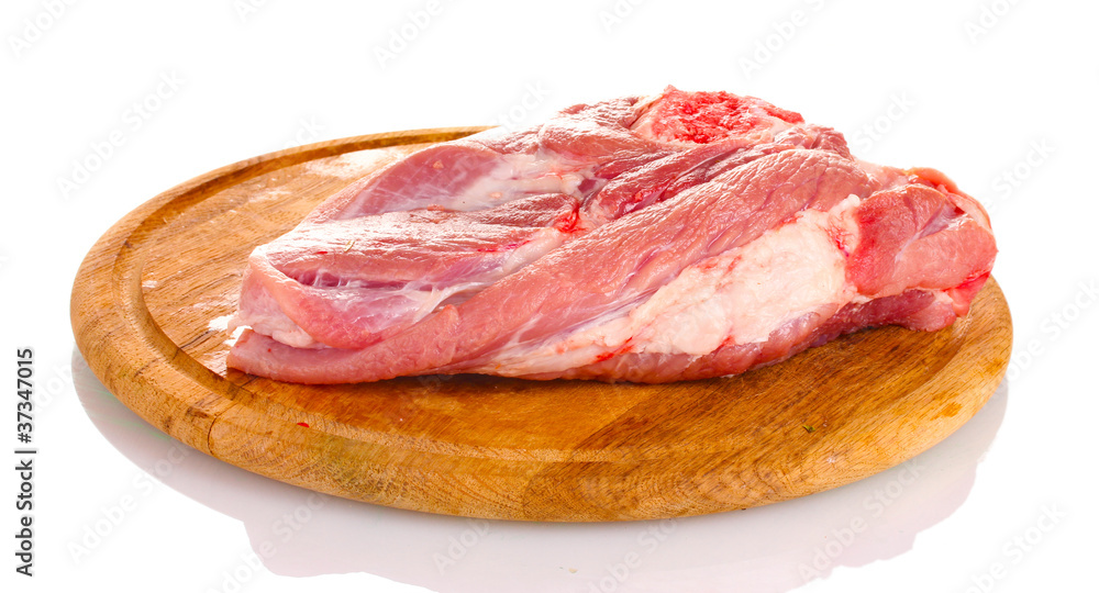 Raw meat on a wooden board isolated on white Raw meat on a wooden board isolated on white
