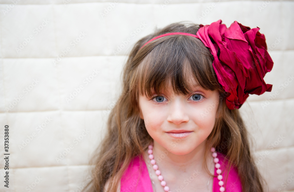 Portrait of little girl with flower headband