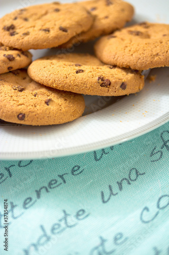chocolate chip cookies on blue table set