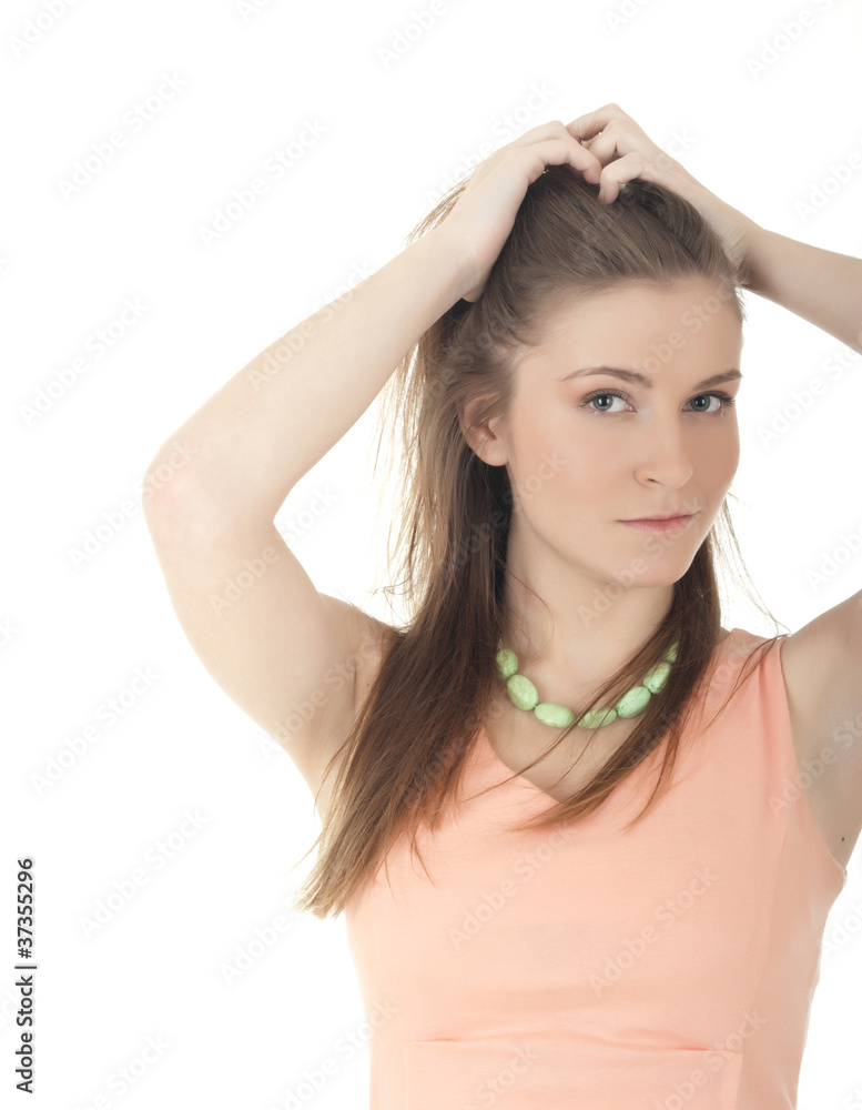 portrait of beautiful young woman with long brown hair posing is