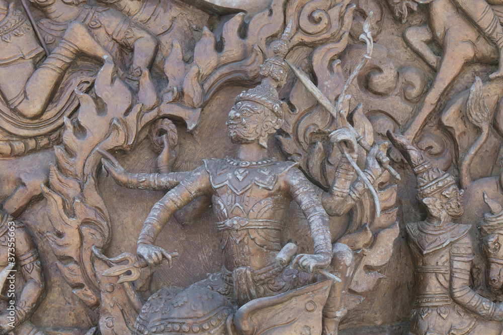 An ancient mural wood carving from Thailand.