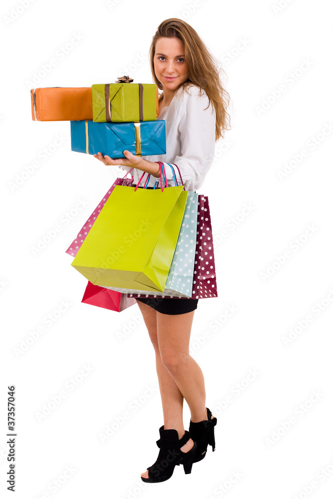 Elegant woman carrying shopping bags and gifts on white backgrou Elegant woman carrying shopping bags and gifts on white backgrou