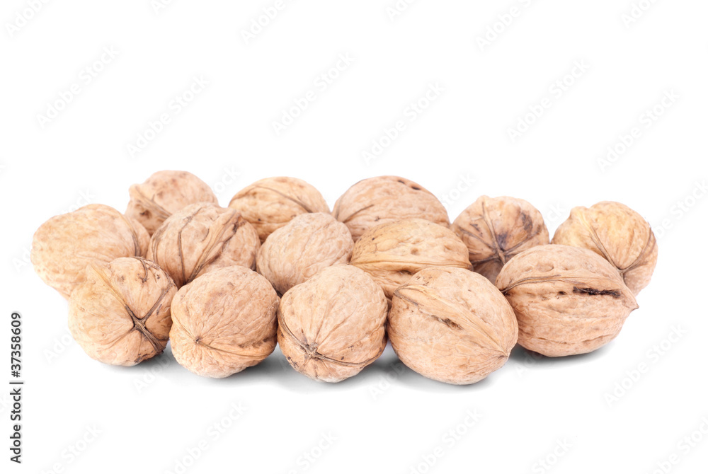 Some walnuts isolated on a white background Some walnuts isolated on a white background