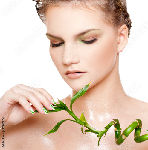 beautiful young woman with bamboo