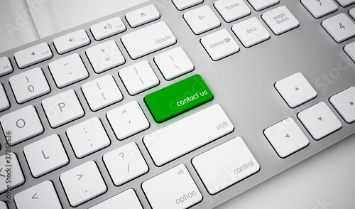 keyboard with green contact us key