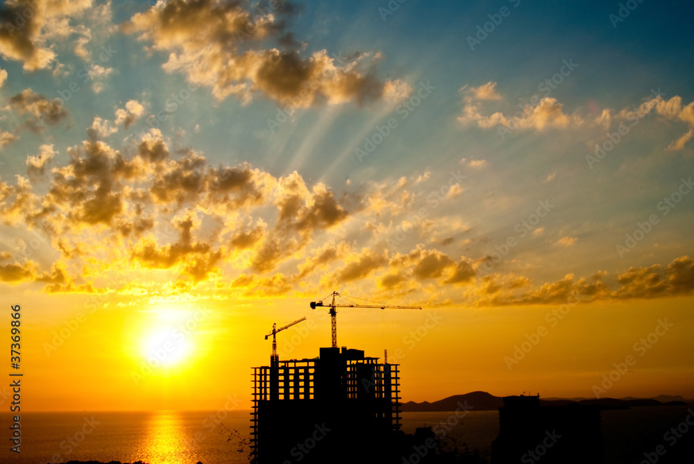 Sun set at back tower crane