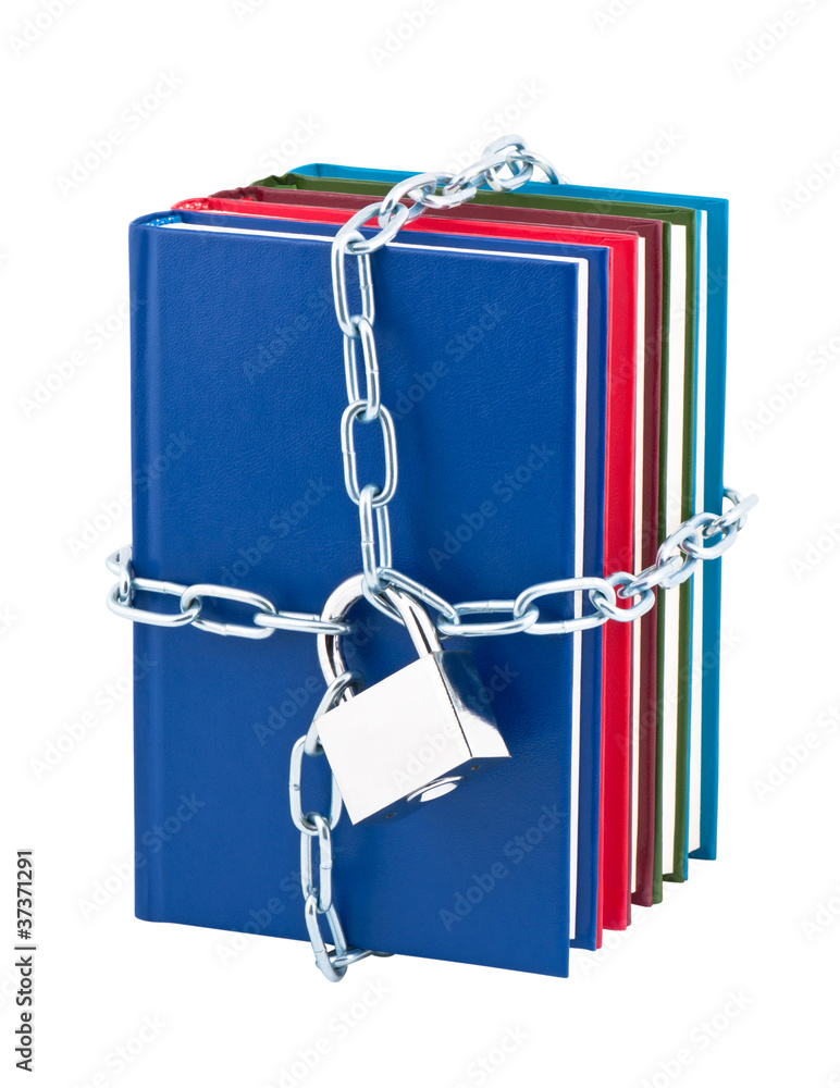 Obraz na plátně Books closed on padlock and chain isolated on white background.