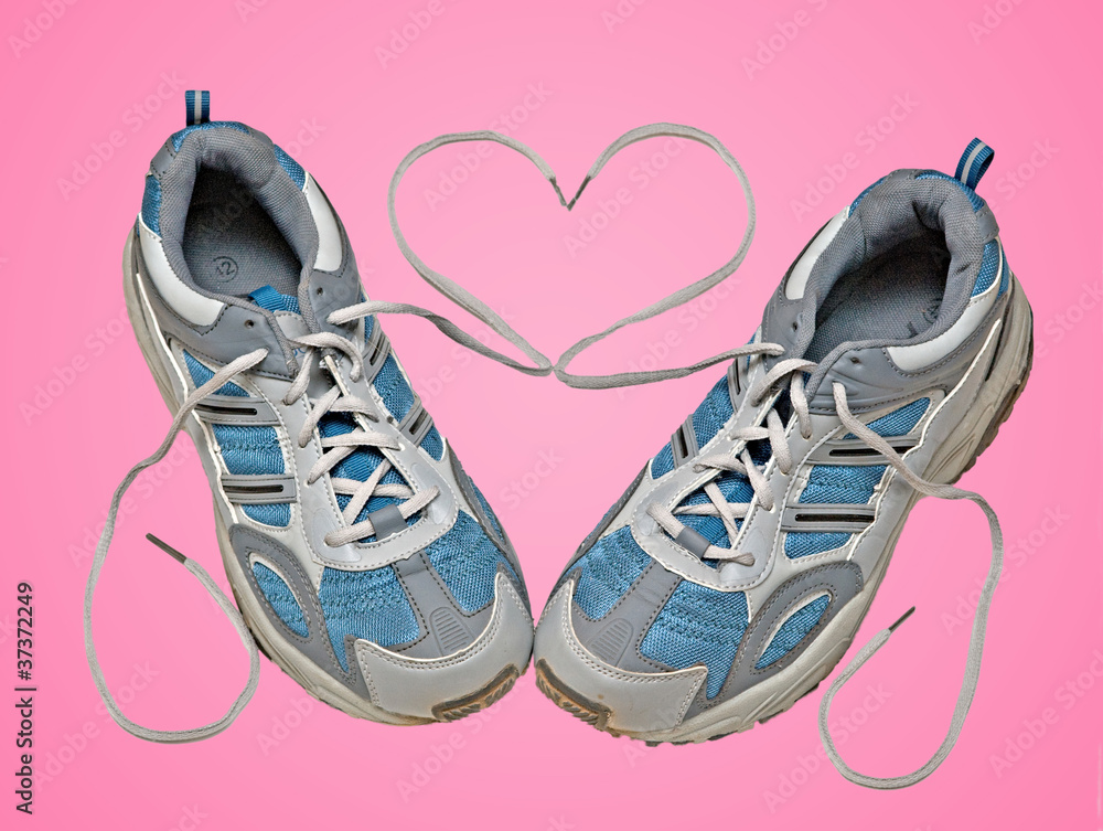 Sneakers isolated on pink background