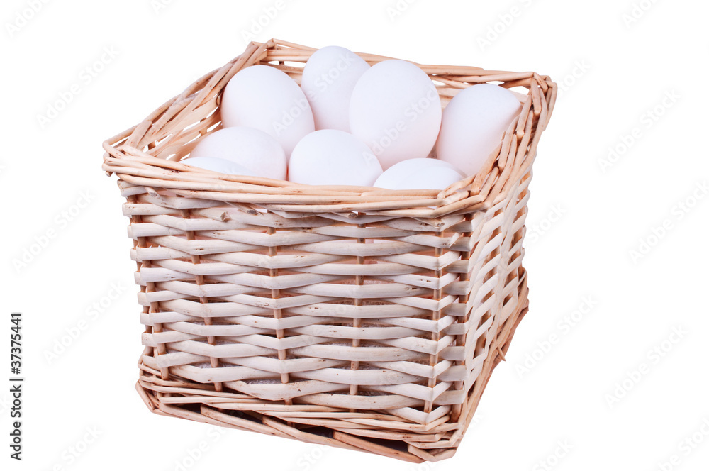 Wicker basket full of  chicken eggs