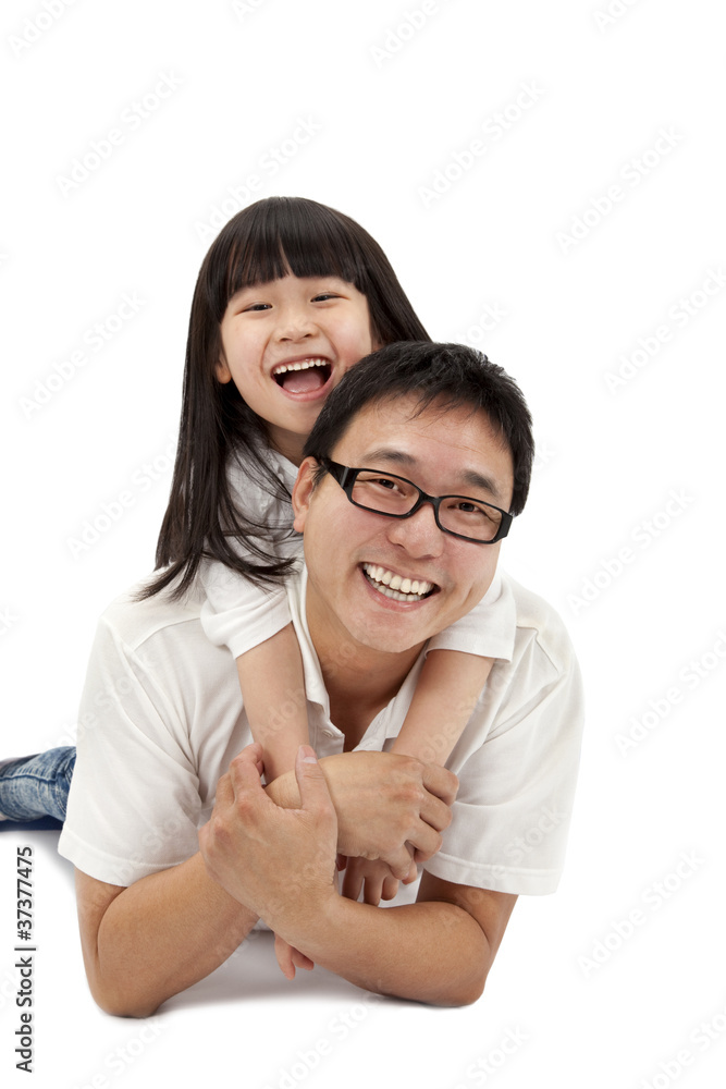 Happy family lying down isolated on white background Happy family lying down isolated on white background