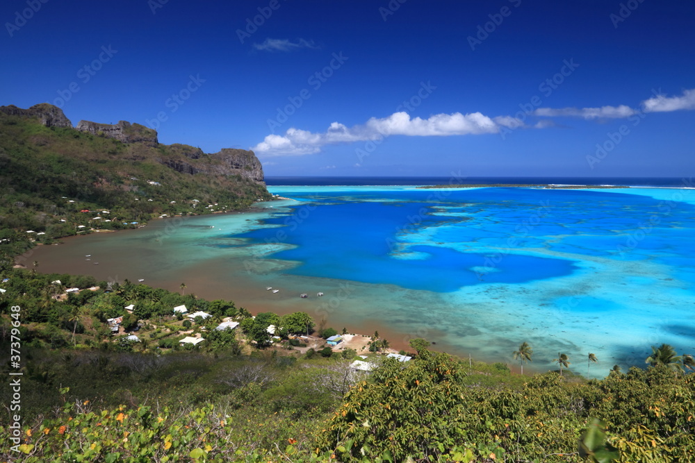 Colorful Lagoon of Maupiti, French Polynesia from above. Colorful Lagoon of Maupiti, French Polynesia from above.
