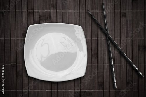 square plate over bamboo pl...