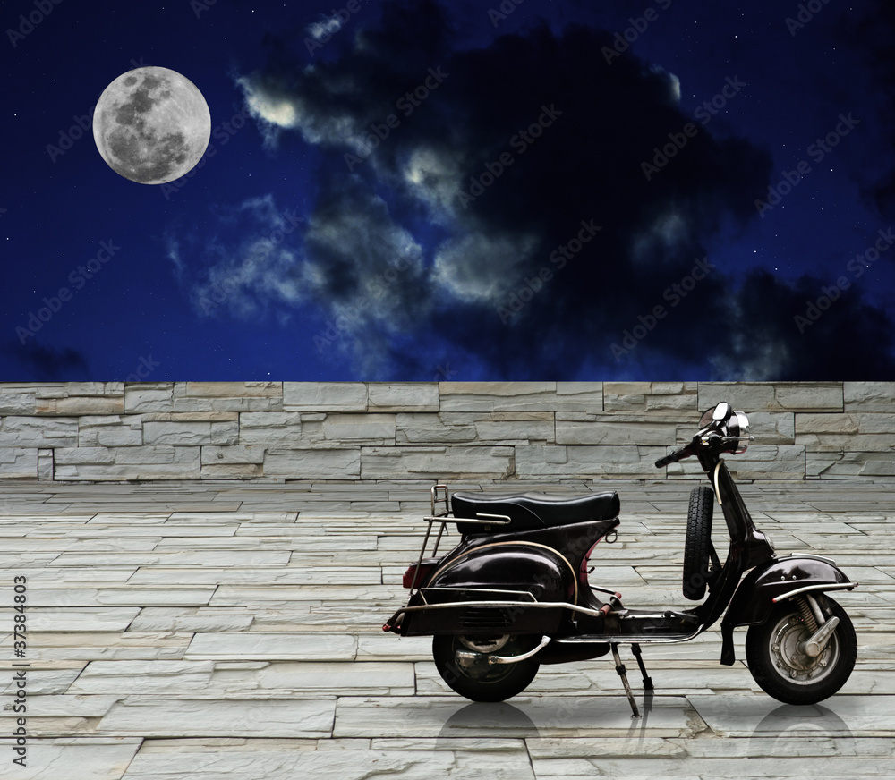 Fototapeta premium Black scooter parking with full moon