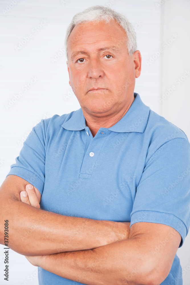Serious Senior Man With Arms Crossed Serious Senior Man With Arms Crossed
