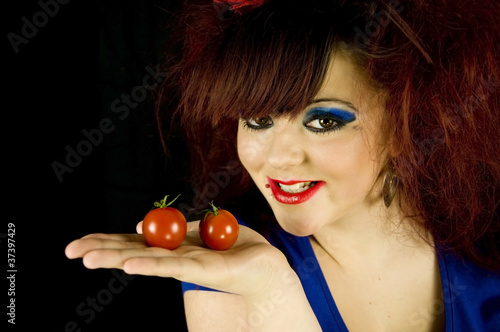 teenage girl with tomatoes