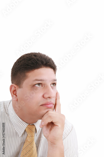 Portrait of handsome thoughtful businessman