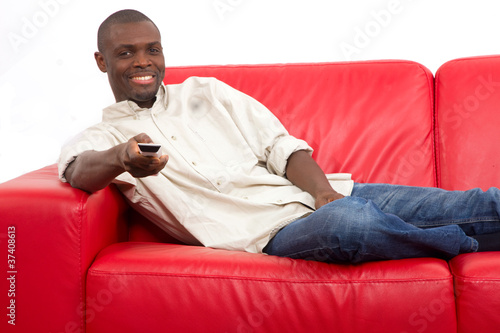 man on the sofa with remote control